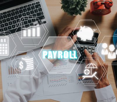 Payroll business finance concept, Businessman analyzing financial data with Payroll icon on VR screen, Financial, accounting.